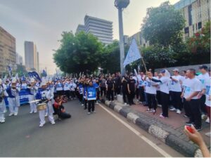 Aksi Gerak Jalan Puncak Harkonas 2026, di Jakarta.